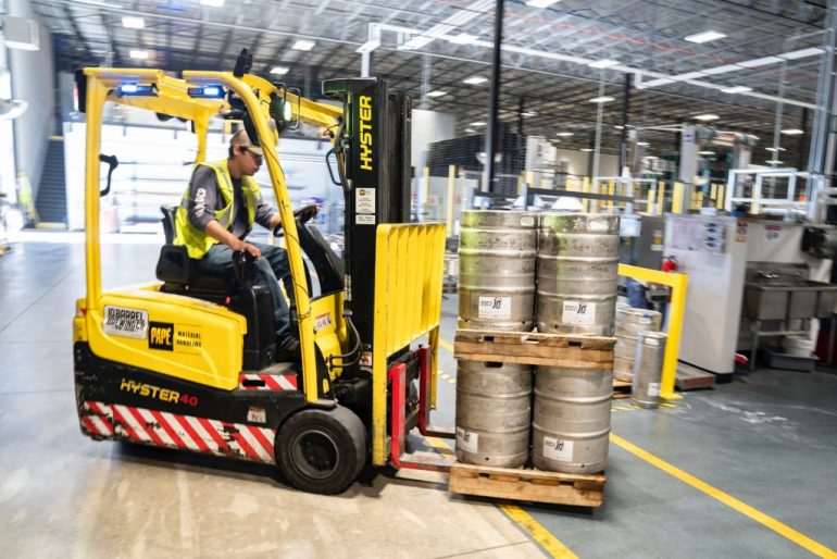 person-driving-yellow-forklift-1267337-1024x683